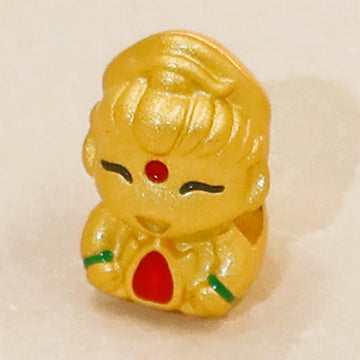 Golden Serenity Charm – Symbol of Protection, Compassion & Prosperity